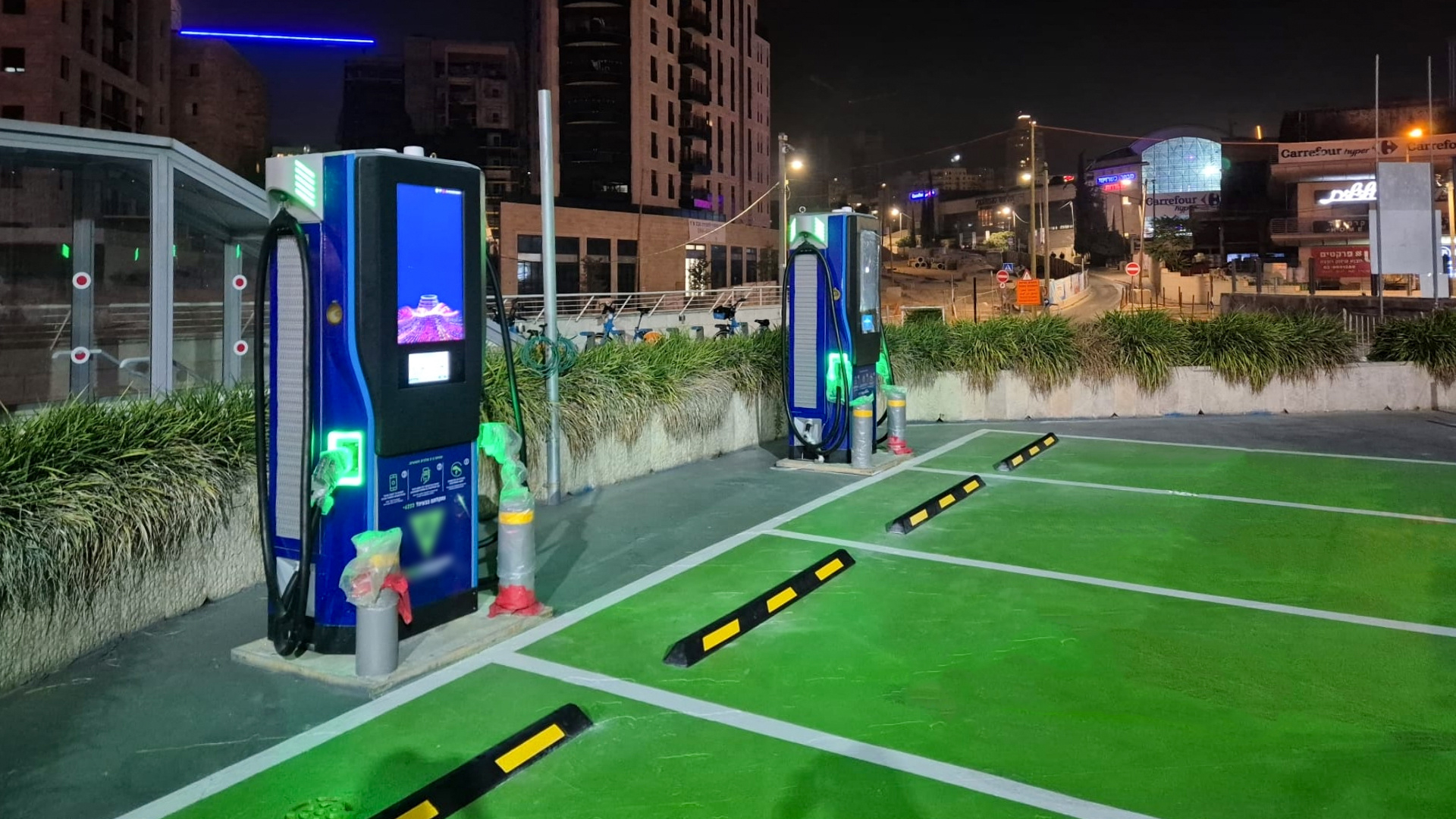 Two 180 kW Injet Ampax Chargers at a Parking Facility in Jerusalem